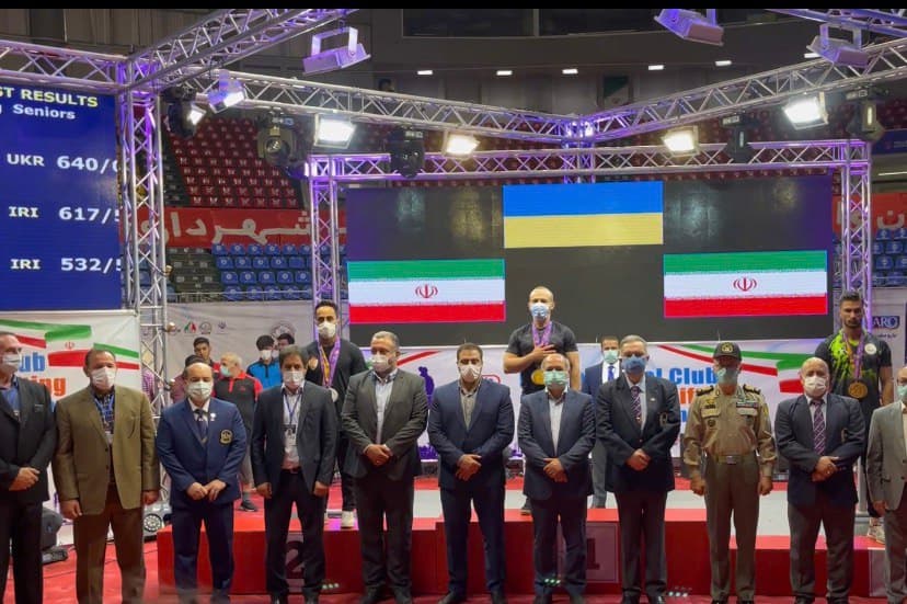 Lined up with the national powerlifting team at an international event